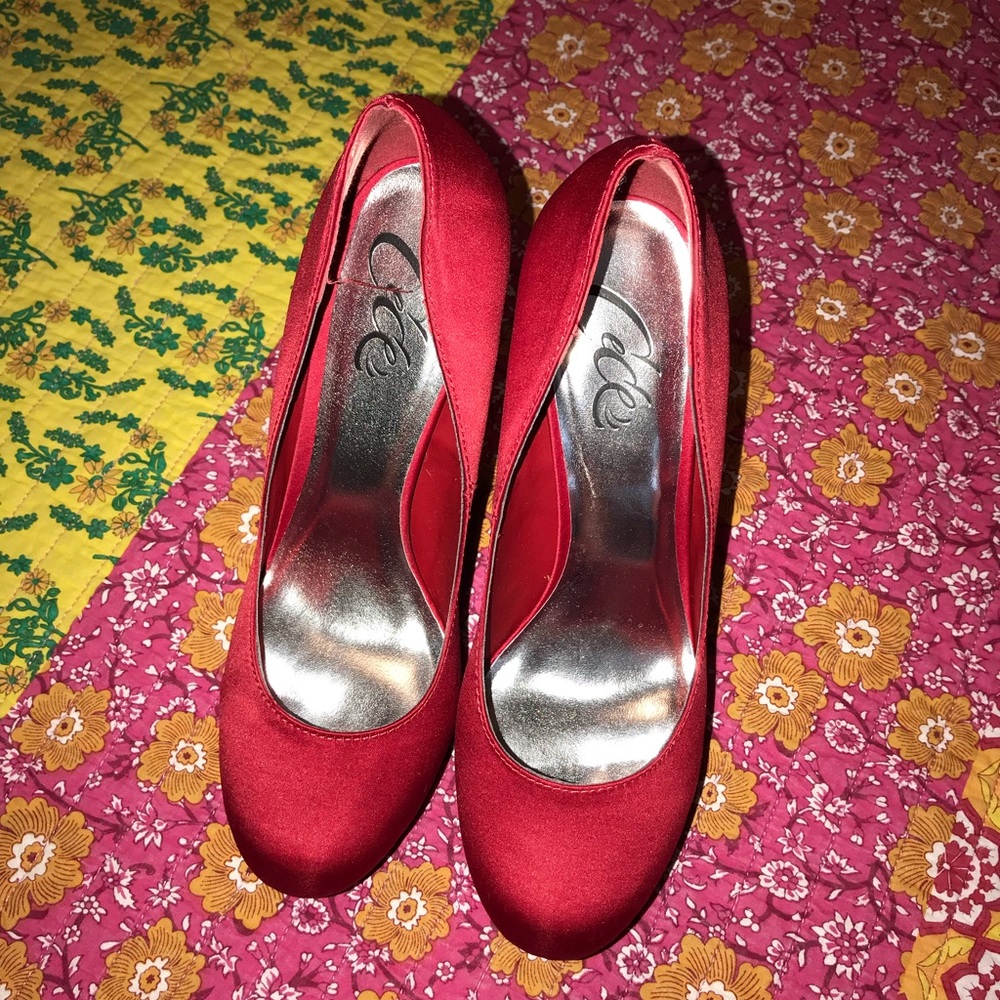 Women’s red platform pumps